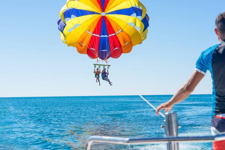 People parasailing near Port Aransas, Texas