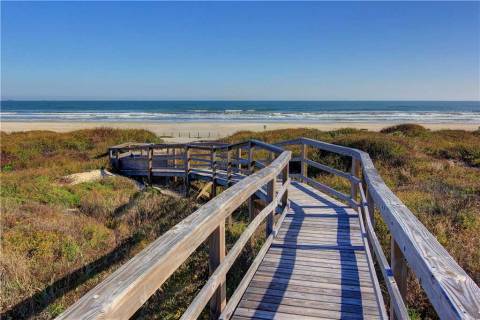A boardwalk down to the beach A boardwalk down to the beach